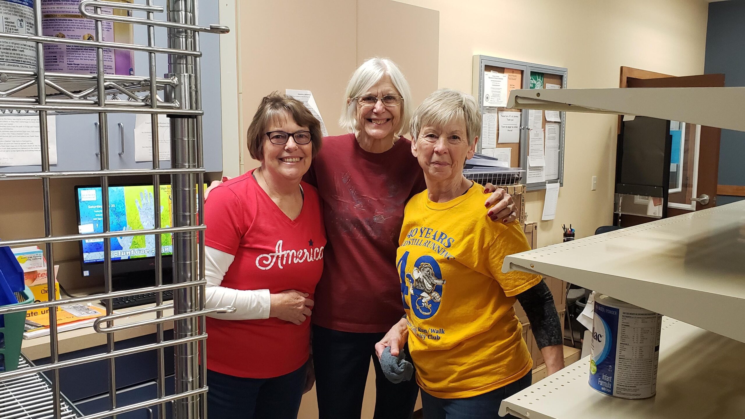 Three women volunteer at the Sauk Prairie Food Pantry.